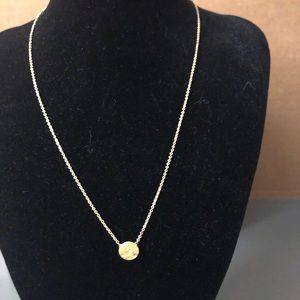 Gold color disc necklace